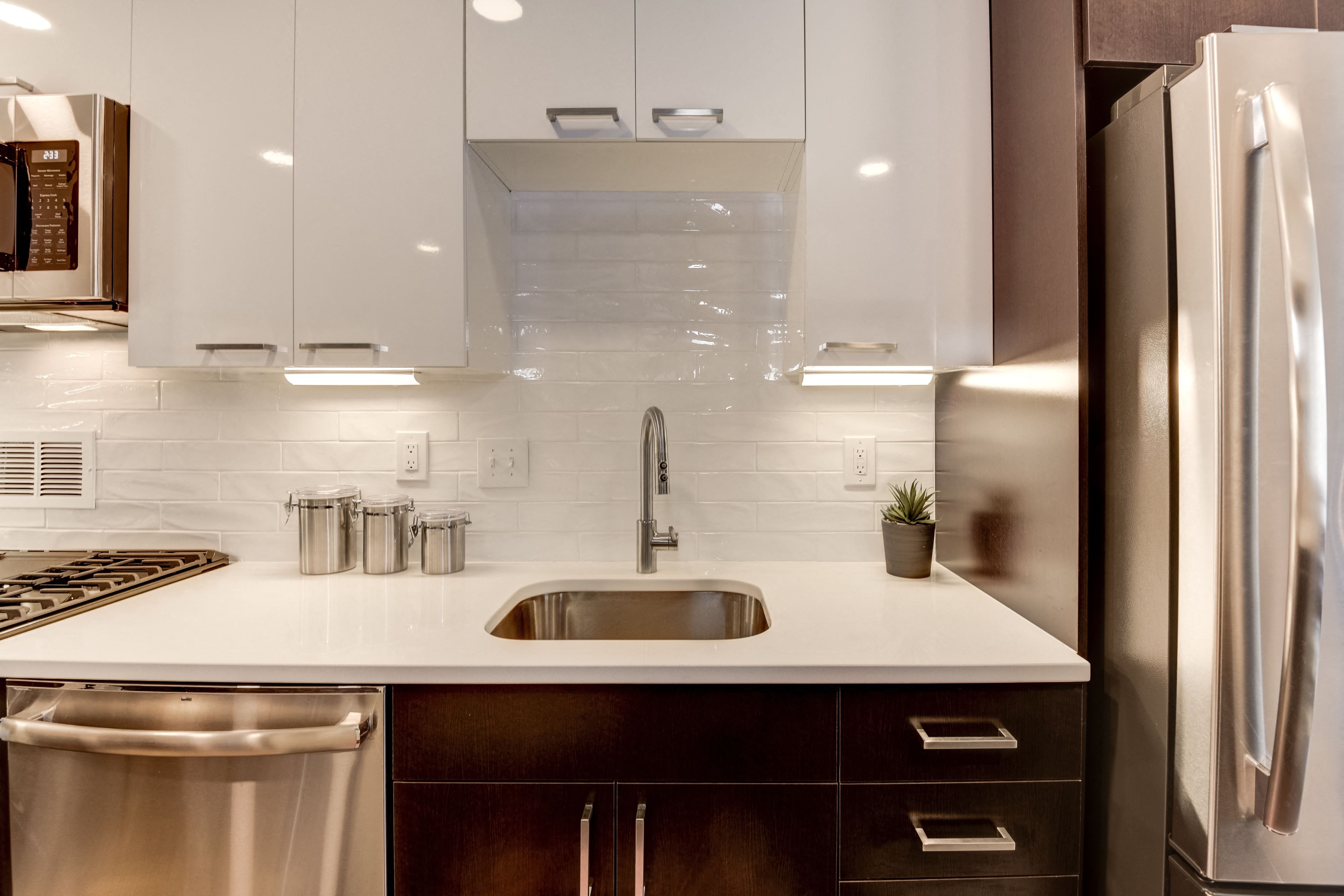 Beautiful Granite-Style Countertops and New Tile Flooring Beautiful Granite-Style Countertops and New Tile Flooring